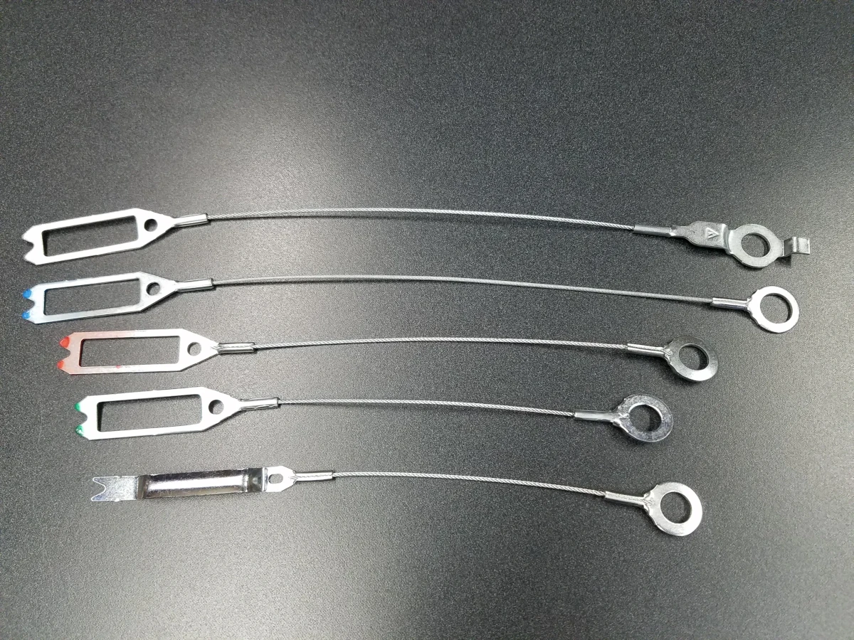 Self-adjusting drum brake cable with terminal connections and technical specifications