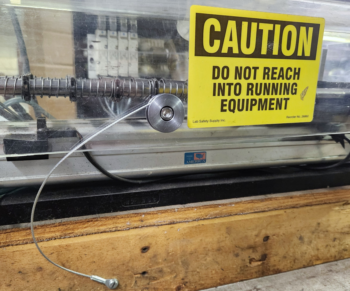 swivel lanyard washer with access component installed showing fastener retention under head